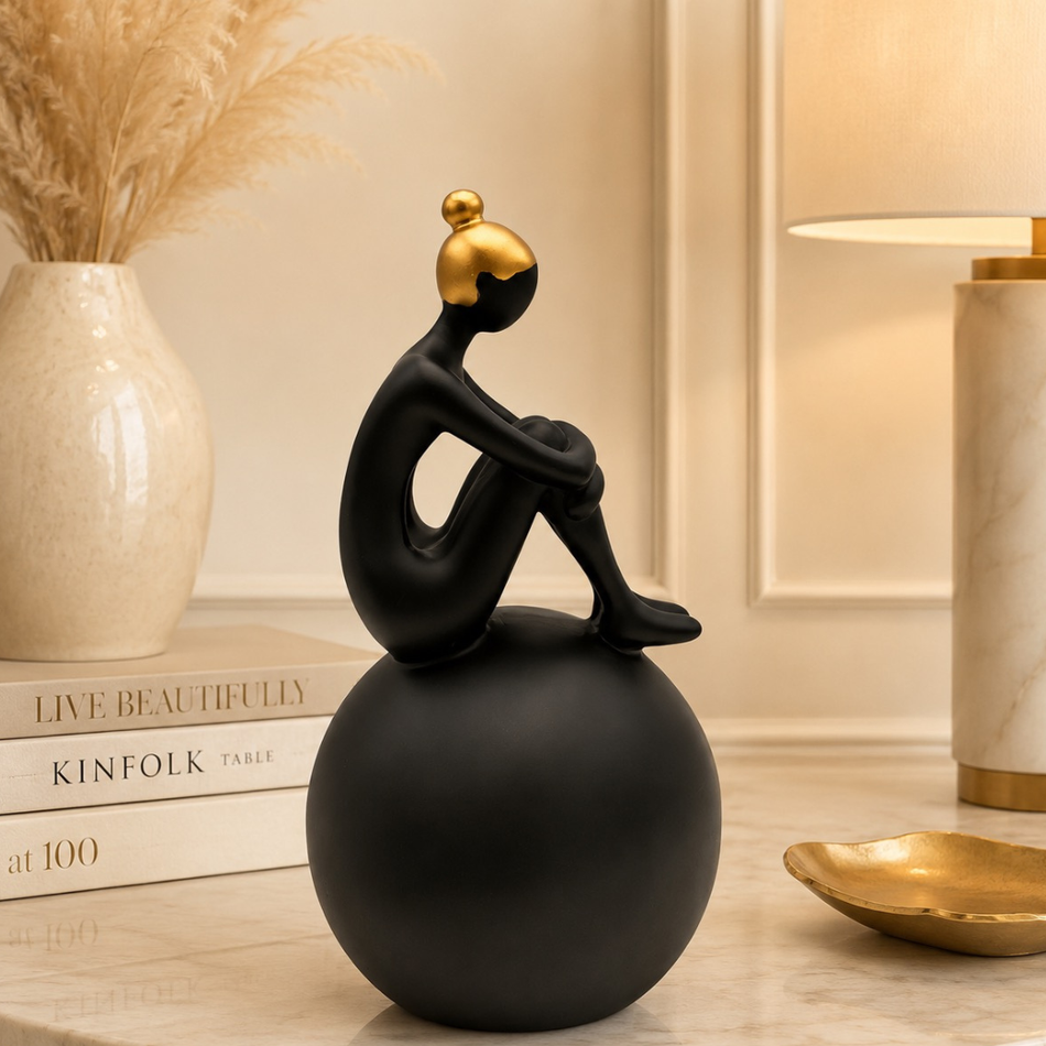 Black & Gold Seated Lady Figurine on Ball 28cm – Resin Sculpture Ornament
