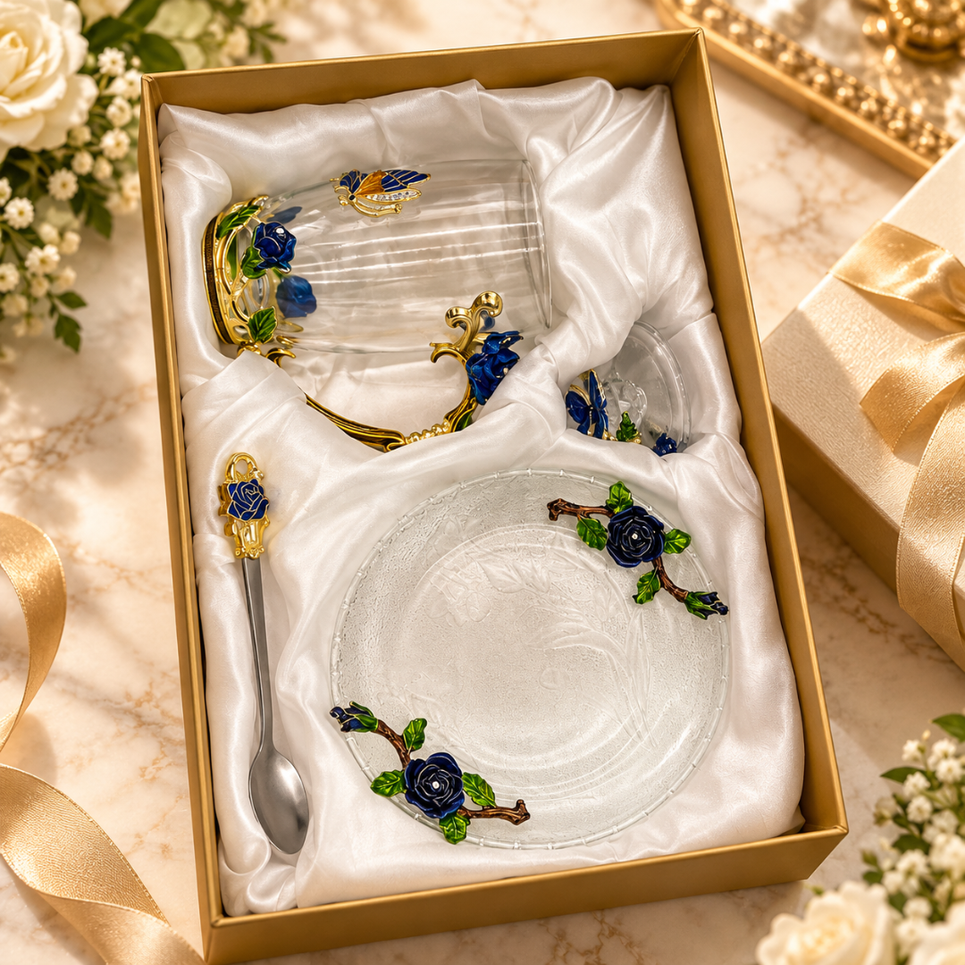 Glass tea cup and saucer set with metal blue rose flowers in its lined gift box