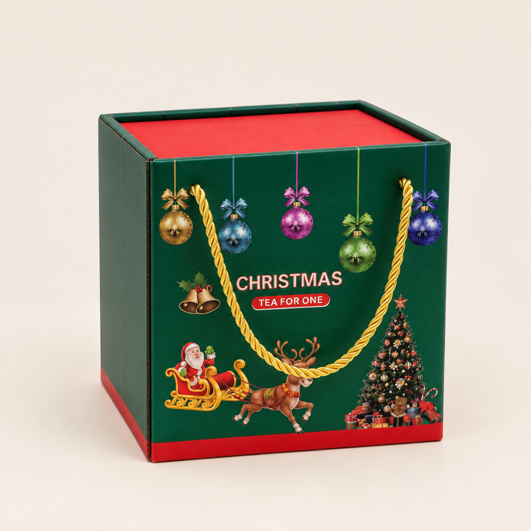 Red snowflake tea for one set in its green and red Christmas gift box