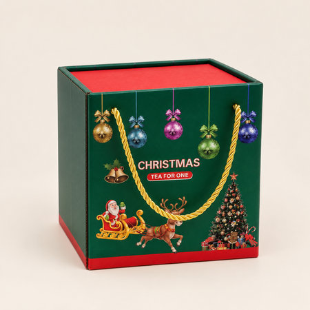 Red snowflake tea for one set in its green and red Christmas gift box
